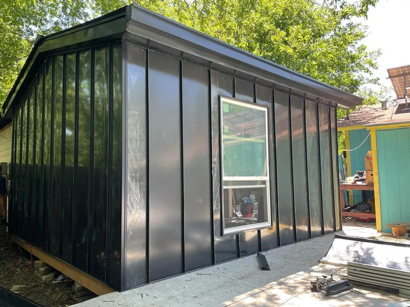 Black standing seam metal wall panels for Roof Inspection in South Bay