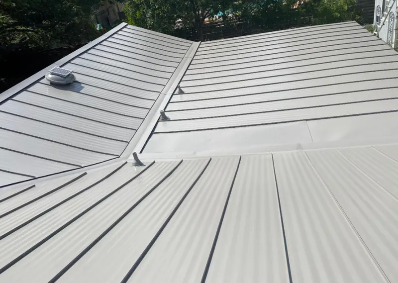 Solar attic fan installed on a metal roof for Roof Ventilation in South Bay